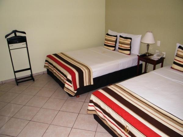 Madero Suites 코아트사코알코스 객실 사진