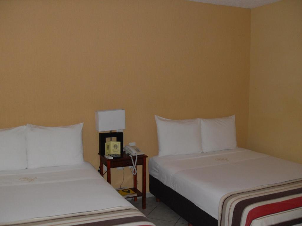 Madero Suites 코아트사코알코스 객실 사진